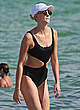 Karlie Kloss in black swimsuit at the beach pics