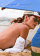 Izabel Goulart sunbathing in bikini & braless pics