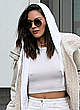 Olivia Munn pokies in white top pics