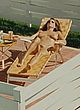 Amy Landecker naked pics - nude sunbathing in backyard