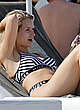 Lottie Moss wearing a bikini at the beach pics