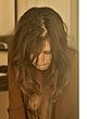 Arly Jover naked pics - showing breasts in the mirror