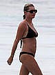 Rebecca Romijn in black bikini on a beach pics