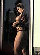 Christina Hearn naked pics - dressed in front of a window