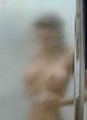 Betsy Russell naked pics - showing blurred tits in shower