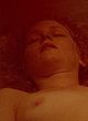 Melissa Leo naked pics - lying & showing breasts