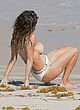Brooke Burke naked pics - flashing her tits at the beach