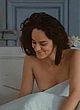 Noemie Merlant naked pics - flashing her boob in bed