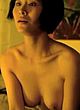 Qing-Qing Wu naked pics - showing her breasts in bed