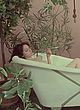 Lina Romay flashing her breasts in tub pics