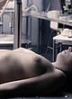 Jodie Comer naked pics - lying on table exposing boobs