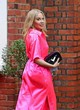 Kylie Minogue sexy in a shiny pink dress pics
