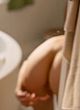 Carla Juri nude boobs and ass in bathroom pics