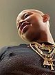 Slick Woods naked pics - showing titties in a mesh top