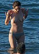 Marion Cotillard showing her tits on the beach pics