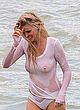 Lara Stone naked pics - wet and see-thru top at beach