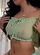 Malu Trevejo breasts in a sheer green top pics