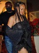 Rihanna shines in a black gown pics