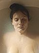 Ana Girardot naked pics - showing breasts in bathtub