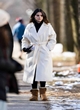 Selena Gomez looks chic in a white coat pics