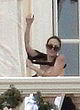 Angelina Jolie naked pics - flashing her boobs outdoor