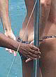 Gisele Bundchen flashing her ass in bikini pics