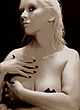 Christina Aguilera posing topless with pasties pics