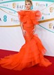 Florence Pugh orange gown at ee bafta 2023 pics