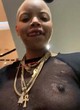 Slick Woods naked pics - fully visible tits in mesh top