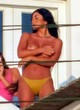 Martha Kalifatidis naked pics - sunbathing her boobs
