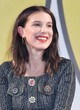 Millie Bobby Brown stuns in gray at comic con pics
