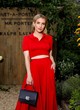 Emma Roberts wears polo top and maxi skirt pics