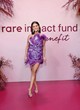 Selena Gomez wows in purple floral minidres pics