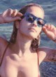 Rita Ora visible nipples in swimsuit pics