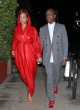 Rihanna wows in red leather coat pics
