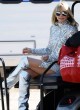 Heidi Klum stuns in silver mini dress pics