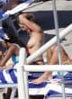 Heidi Klum shows her boobs on the beach pics