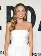 Margot Robbie in show-stopping white dress pics