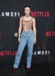 Millie Bobby Brown in floral corset and jeans pics