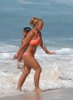 Britney Spears sports a pastel orange bikini pics