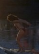 Apollonia Kotero naked pics - topless by the river, big tits