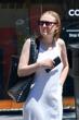 Dakota Fanning’s Dakota Fanning's Effortless Chic: A Summer Stroll in L.A. pics