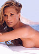 Molly Sims posing in lingerie & topless pics