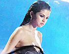 Selena Gomez flashes side boob in wet clips