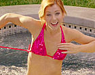 Alyson Hannigan removes top in hot tub nude clips